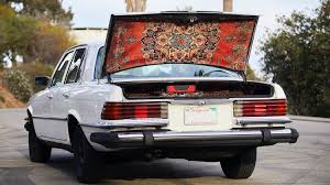 this car is upholstered in persian rugs