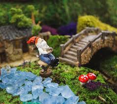 tiny garden gnome on stool w bird s