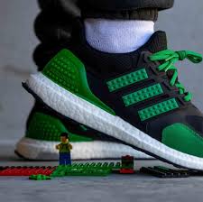 We also have lego's signature yellow and red accents throughout while. Lego X Adidas Ultraboost Surfaces In Black And Green