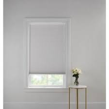 Cordless honeycomb window shades that are child and pet safe, and come in many colors. Home Decorators Collection Cut To Size White Cordless Blackout Polyester Motorized Cellular Shade With Remote Control 67 In W X 72 In L 10793478827510 The Home Depot