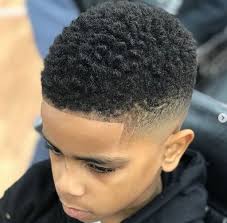 With a buzz cut and line up, this simple yet cool short haircut is a popular one in barbershops. 60 Little Black Boy Haircuts For Curly Hairs 2021 Mrkidshaircuts Com