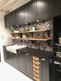 kitchens go dark with black countertops
