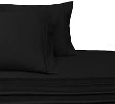 plush cotton 800 thread count bed in a