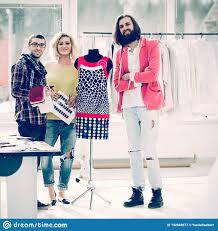 Group For Fashion Designers In Studio On A Background Of New