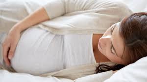 should pregnant women avoid sleeping on