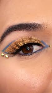 blue gold graphic eye makeup tutorial