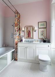 Pink Bathroom With Mirror Clad Bathtub