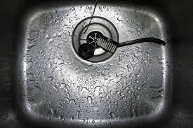 cleaning a kitchen sink drain expert