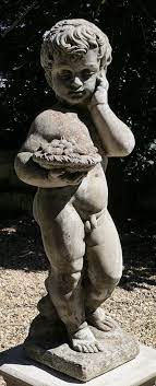 An Old Weathered Nude Boy Garden Statue