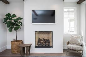 Sleek White Bedroom Fireplace With Flat