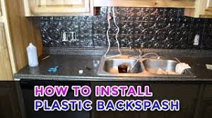 An updated twist on the typical subway tile pattern. How To Install Plastic Backspash Youtube