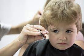 .ideas about haircut for baby boy on pinterest see more ideas about baby boy haircut styles baby hair cut style and toddler haircuts near me. Haircut That Your Kid Will Love Cute Boys Hairstyle Kids Hair Salon Little Child Given Haircut Small Child In Stock Photo Image Of Toddler Style 138149486