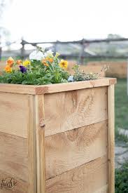 This planter box consists of four separate panels and the bottom slats. How To Make An Easy Diy Cedar Planter Box Twelve On Main
