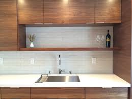 kitchen with walnut cabinetry and heath
