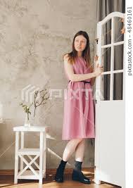without makeup in pink dress with