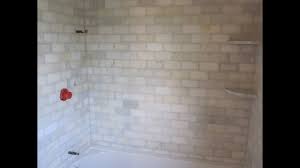 It's a modification of a traditional bathroom tile subway made up of two contrasting colors white and grout. Marble Subway Tile Bathroom Youtube