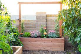 From simple to stunning, these designs fit every kind of garden. Building A Raised Planter Bed With A Trellis Diy Dalla Vita