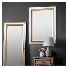 glass framed wall mirror with gold trim