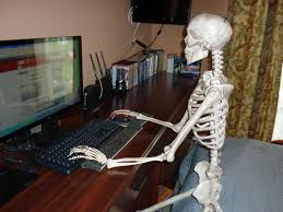 Image result for skeleton sitting by computer waiting