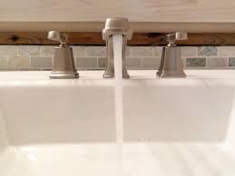 It sounds like either one or both cartridges in the handles need to be replaced. How To Replace A Bathroom Faucet How Tos Diy