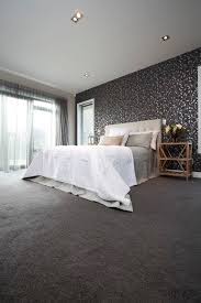 grey carpet white bed linen dark