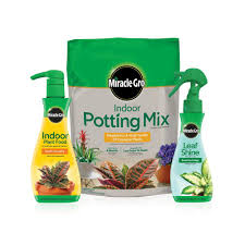 miracle gro indoor potting mix indoor plant food leaf shine bundle of potting soil 6 qt liquid plant food 8 oz leaf shine 8 oz