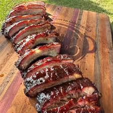 smoked baby back ribs cooking in the