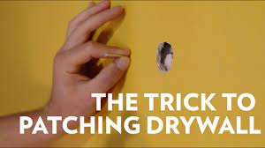 To repair a large hole in drywall, first draw a square. How To Patch A Hole In Drywall And Texture Walls Youtube