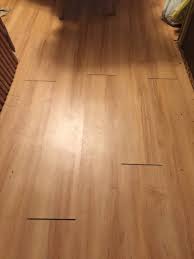 Install the appropriate nosing piece flush or over the stair tread nose to transition between the tread and riser. The Vinyl Plank Click Flooring I Installed In Two Rooms Develops Gaps At The Ends Between The Two Rooms Can I Glue The Ends Together In This Area Home Improvement Stack