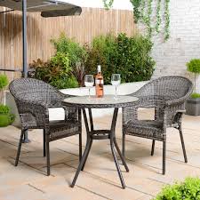 small outdoor bistro table and 2 chairs