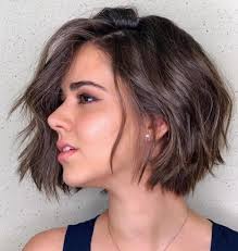 13 Feminine Short Haircuts For Wavy Hair: Trending Right Now