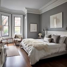 A Gray Bedroom With White Trim And Dark