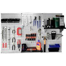Gray Pegboard And Black Peg Accessories