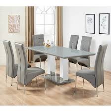 This round dining table seats four, making it ideal in your smaller dining space or breakfast nook. Monton Grey Glass Extendable Dining Table And 6 Dining Chairs 899 95 Go Furniture Co Uk