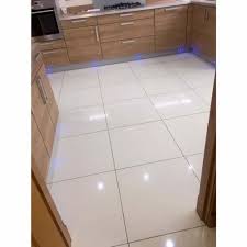 white ceramic floor tile at rs 600 box