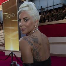 Placement ideas for tattoos on women. Lady Gaga S Tattoos The Meaning Behind The Singer S Ink