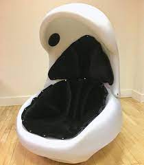 egg style chair with speakers and