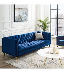deep seated diamond tufted blue velvet sofa