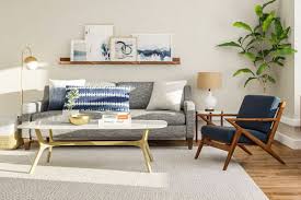 You can spot its influences everywhere from furniture to home décor. 8 Mid Century Modern Living Room Ideas We Love Modsy Blog Mid Century Modern Living Room Mid Century Modern Living Room Decor Mid Century Modern Living Room Design