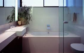 a modern bathroom with a designer glass