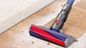 the dyson v6 fluffy vacuum is on