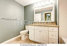 Update your bathrooms with stylish granite vanity tops. White Bathroom Vanity Cabinet With Granite Top And Mirror Aqua Color Walls And Beige Tile Floor Canstock