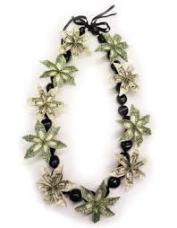 They are nice to use in this craft so that your recipient doesn't rip their money when they take the lei apart. Money Leis For Graduation