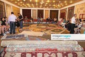 tourists visiting the galata carpet