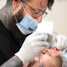 Another form of body modification that is not as common as tattoos but that does use the same principle is known as scarification. Cutting Into A Guy S Face With The World S Most Famous Body Modification Artist