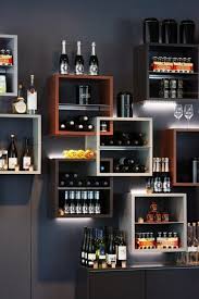 A bar cart is a versatile addition because it can be used as a full bar in a smaller home or a secondary bar for larger events and still provides room for all your happy hour favorites. Gorgeous Minimalist Wine Wall Display Home Bar Decor Modern Home Bar Bars For Home