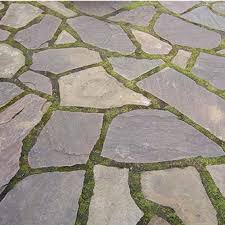example of a flagstone patio with grass