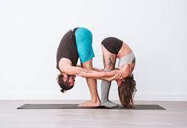 6 partner yoga poses to strengthen your
