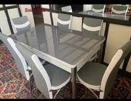 new extendable dining table with 4 or 6