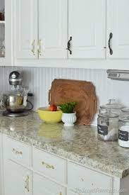 We cut them to the proper height and utilized the full 4′ width to keep seams to a minimum. How To Install A Diy Beadboard Backsplash Kitchen Makeover The Frugal Homemaker